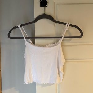 Garage cropper tank with ruffled edges